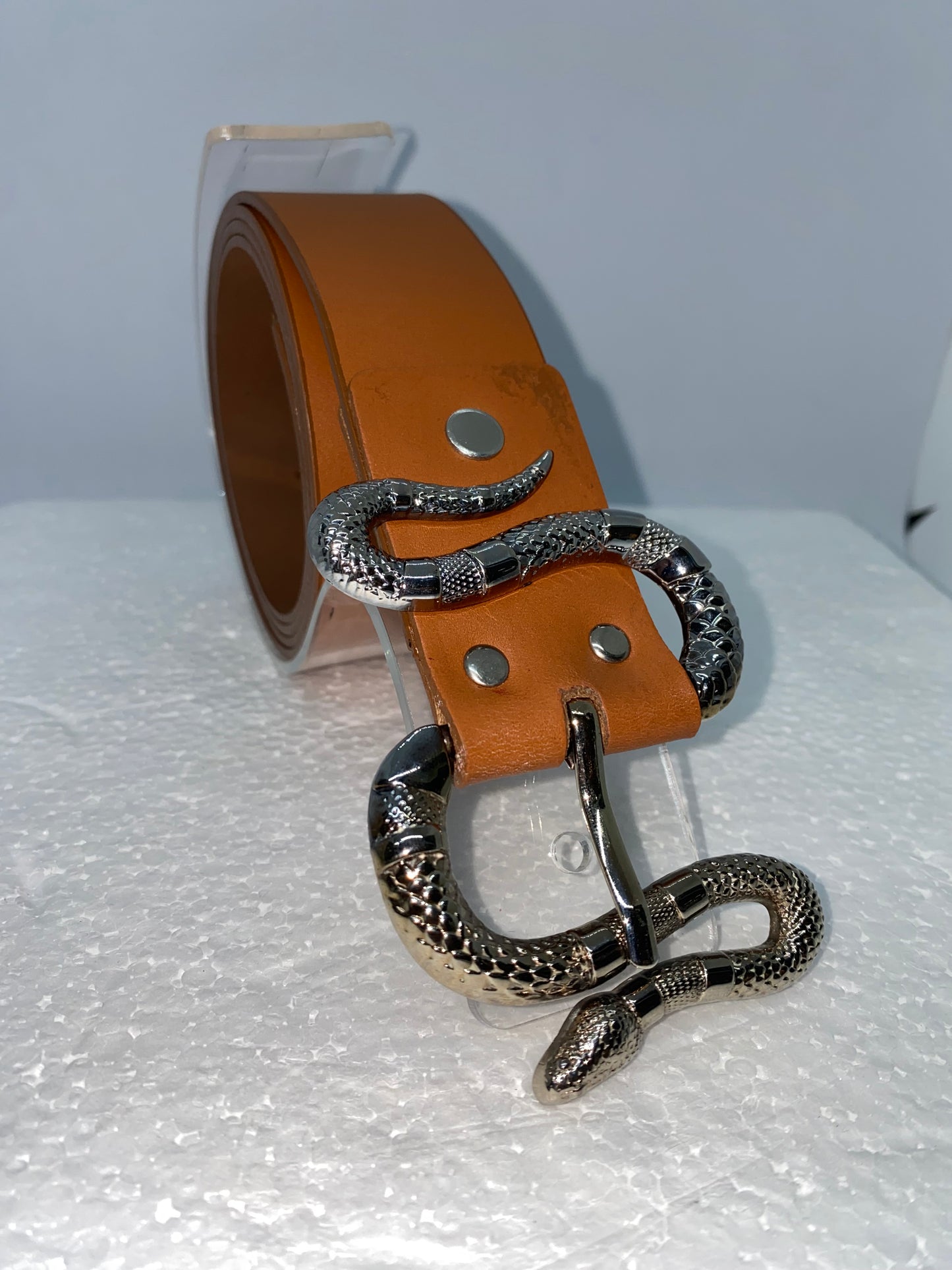 CODC25 - Correa de cuero para dama con firma de serpiente