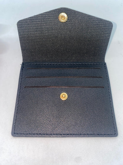 TS6 - Tarjetero Sintético con broche marca Quality Leather
