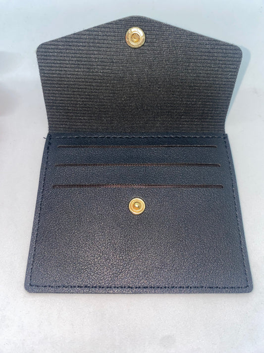 TS6 - Tarjetero Sintético con broche marca Quality Leather