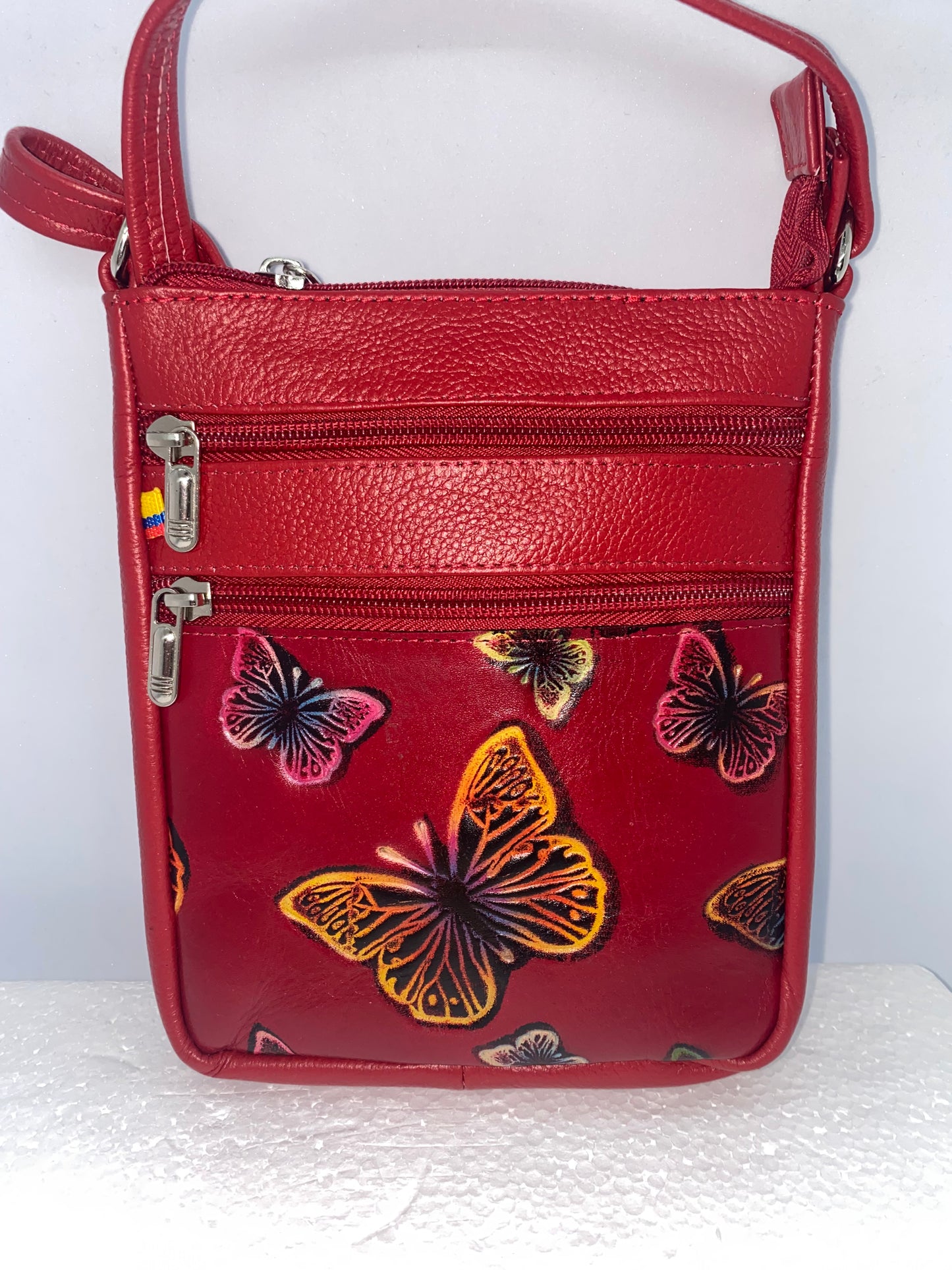 CMP35 - Carriel de cuero pintado con mariposa