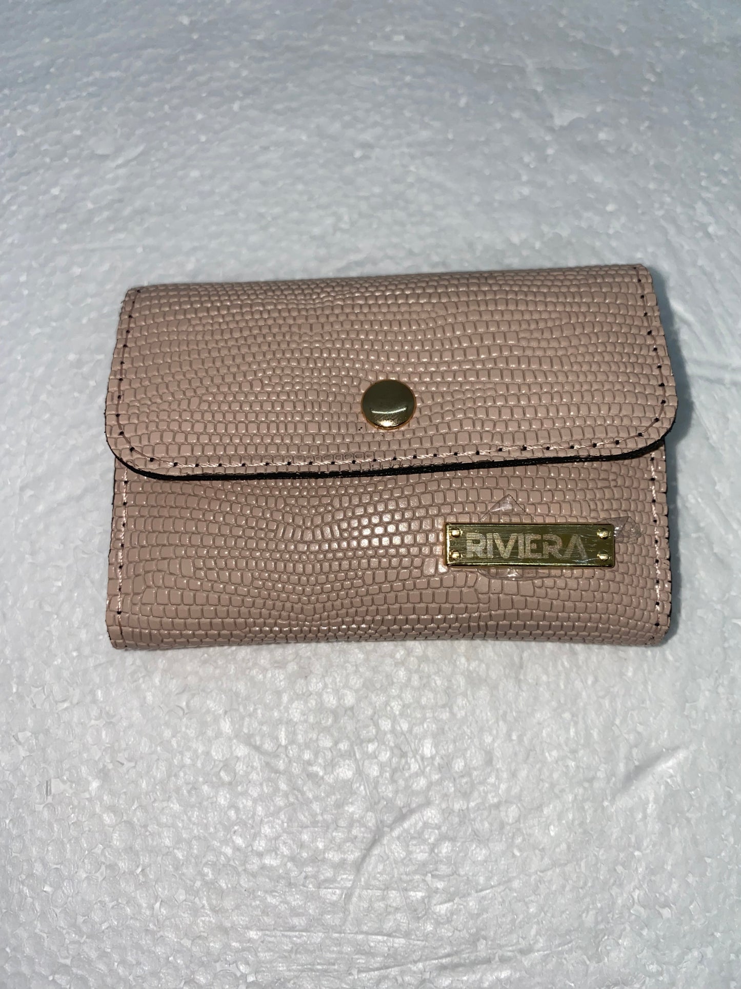 T18 - Tarjetero acordeon de cuero con broche marca Riviera
