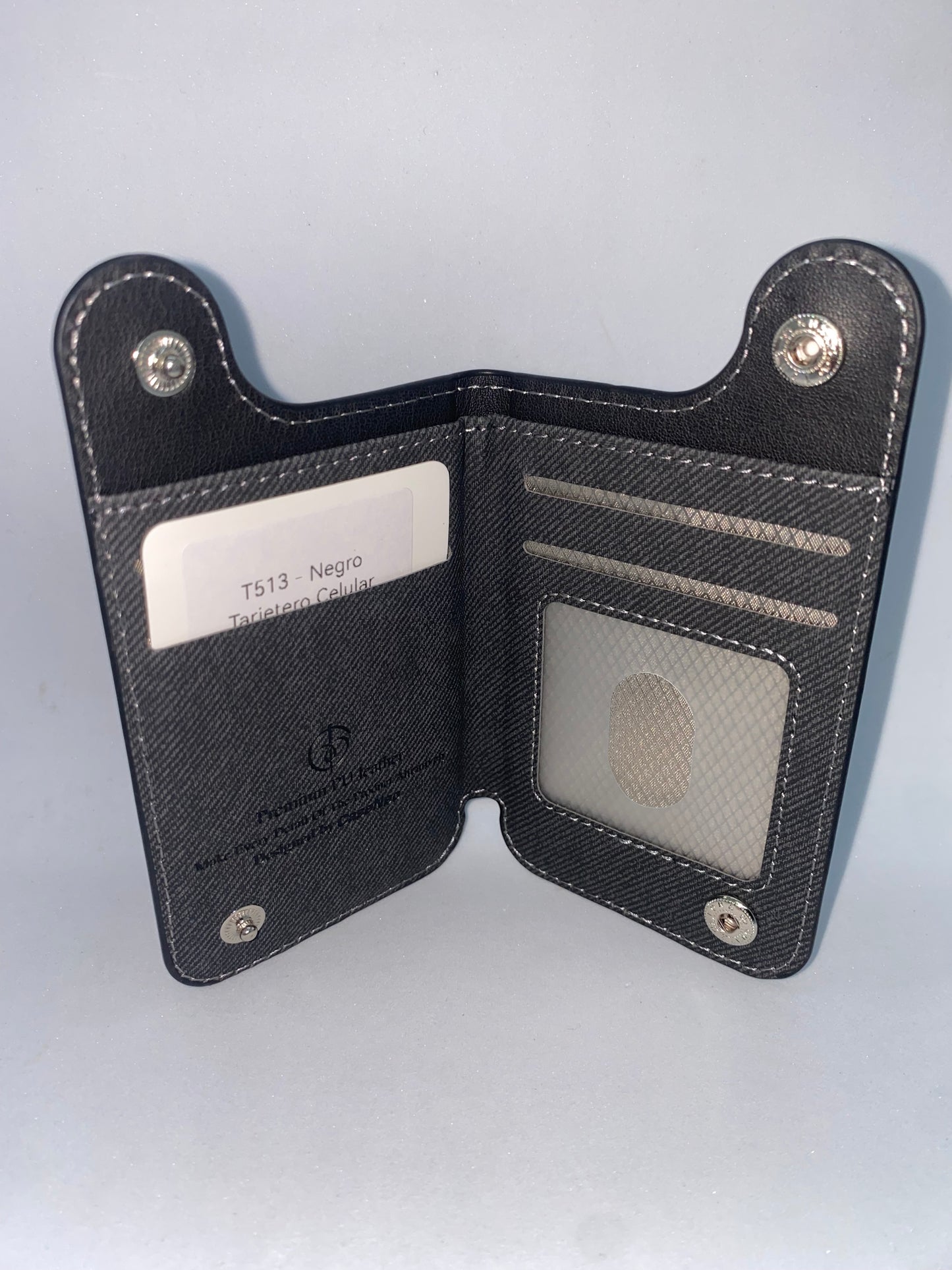 T513 - Tarjetero de Cuerina aderible al Celular marca CaseNeo