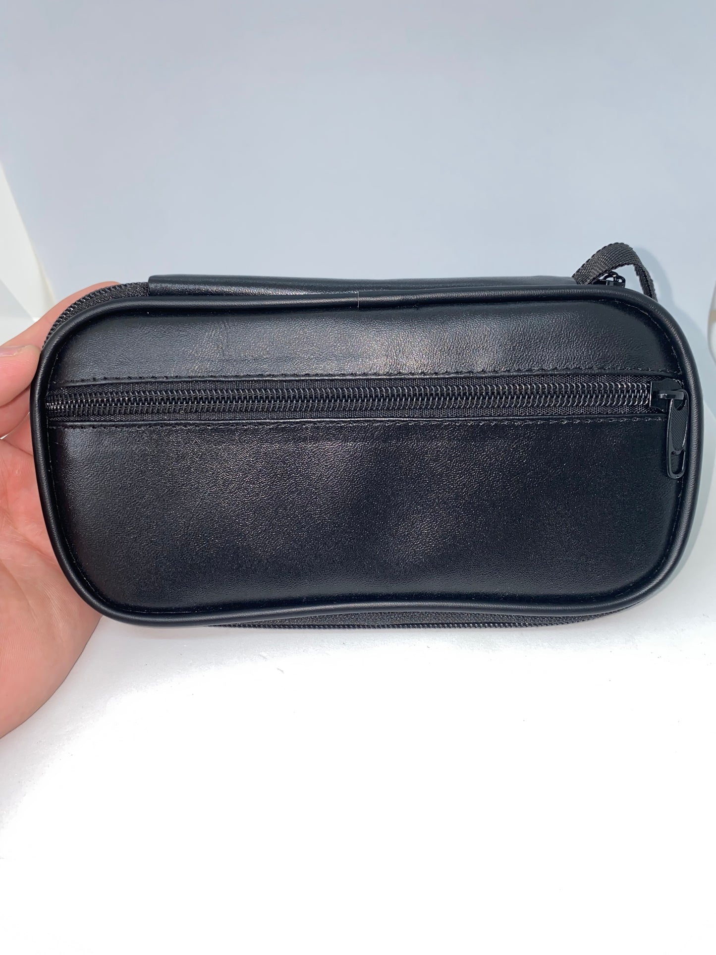 EV25 - Estuche de viaje de cuero y lona marca Riviera